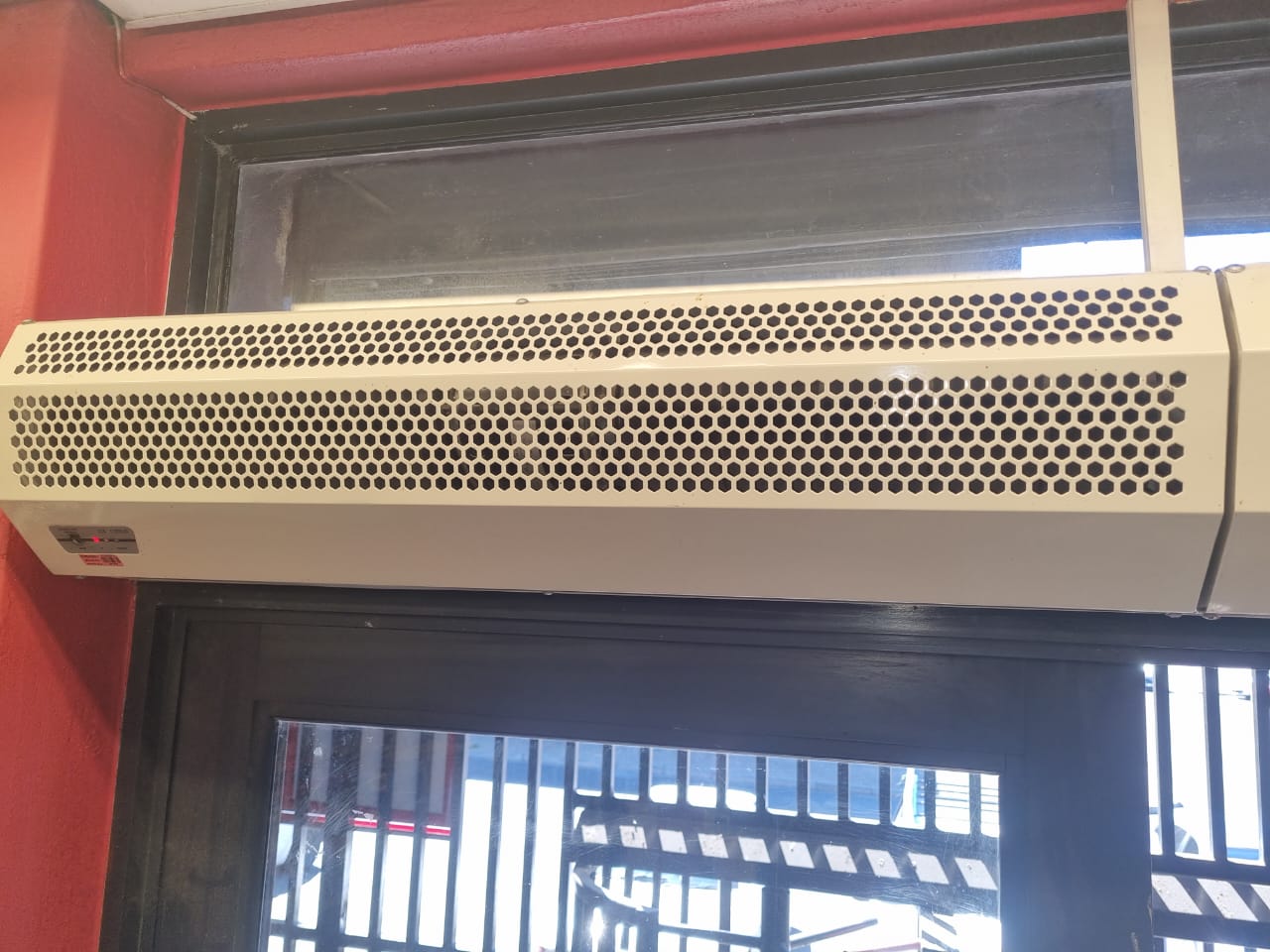 Heavy-duty perforated air curtain