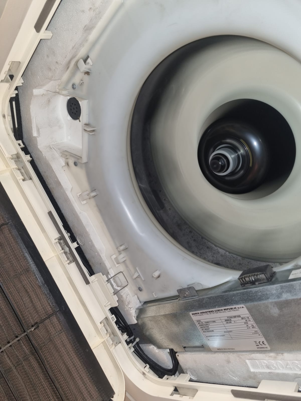 Daikin FCQG indoor unit — blower & data plate