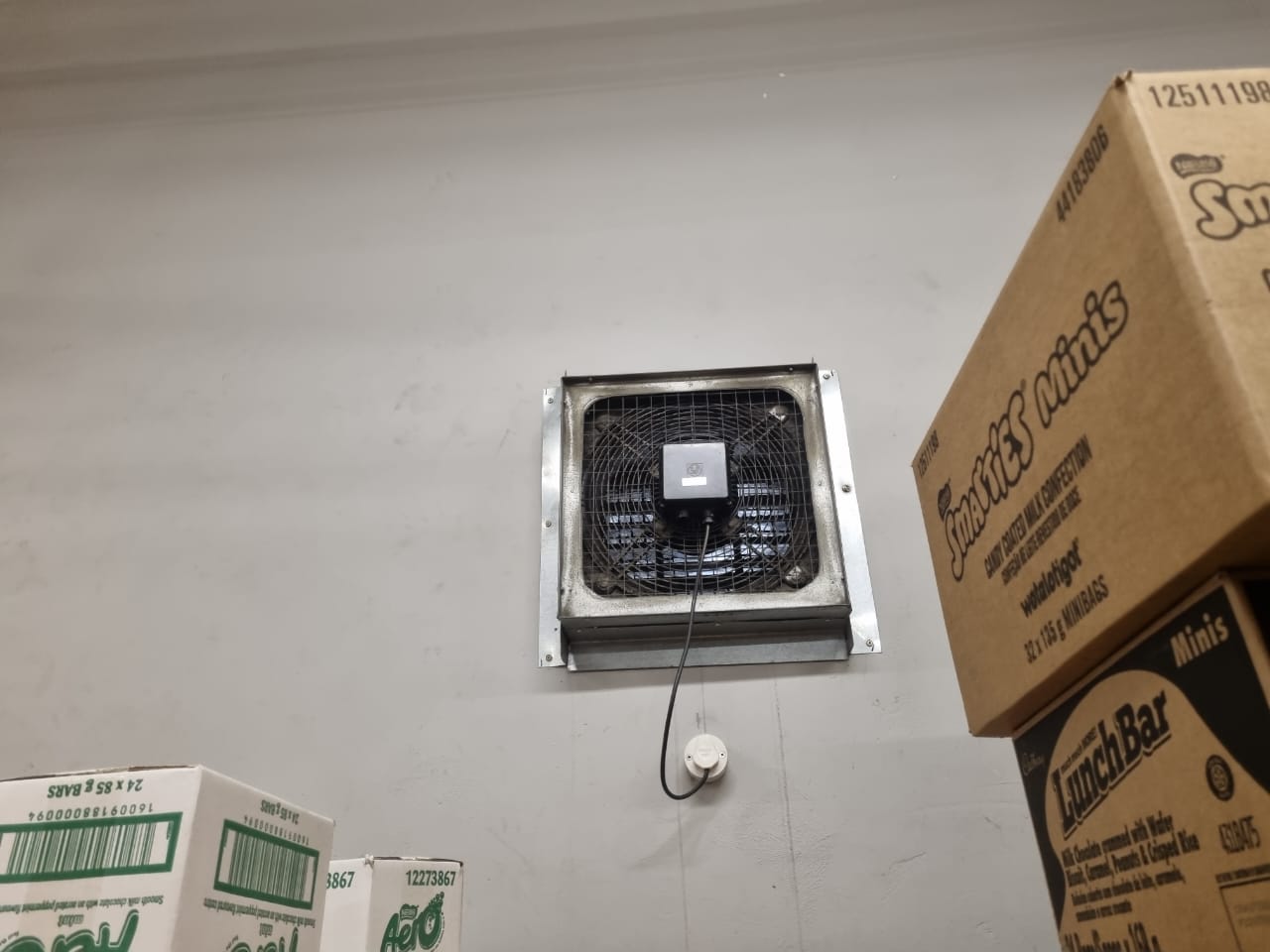 Wall-mounted box extractor fan — storeroom ventilation