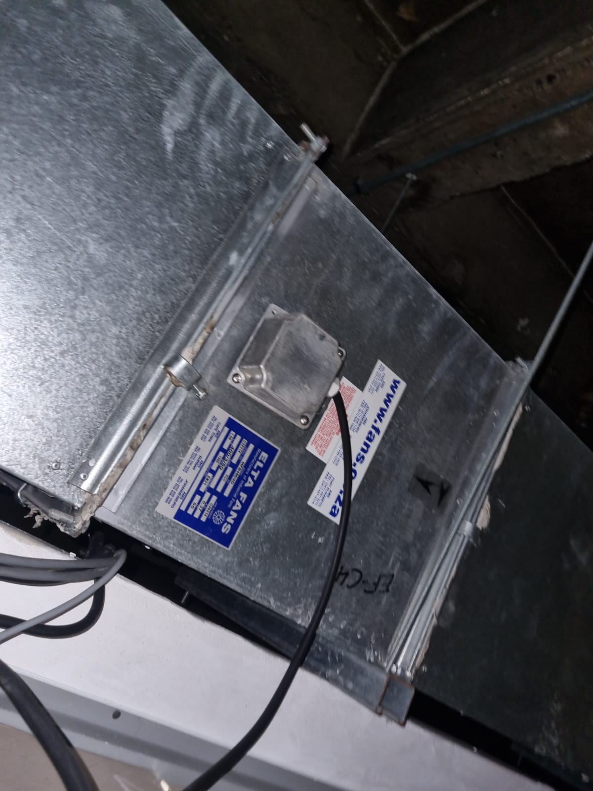 Elta Fans inline extractor — branch ducting installation