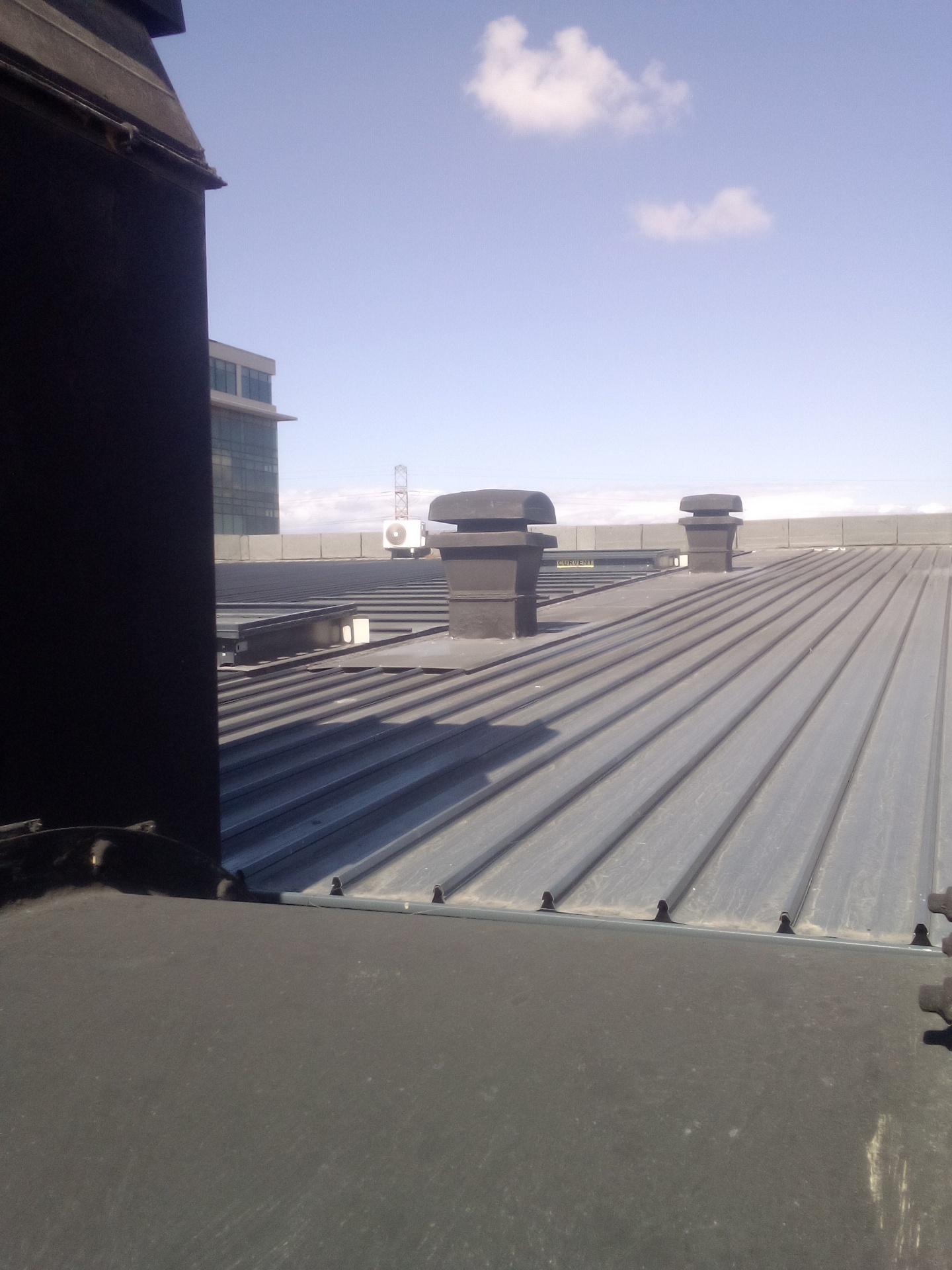 Curvent roof ventilators on profiled metal roof