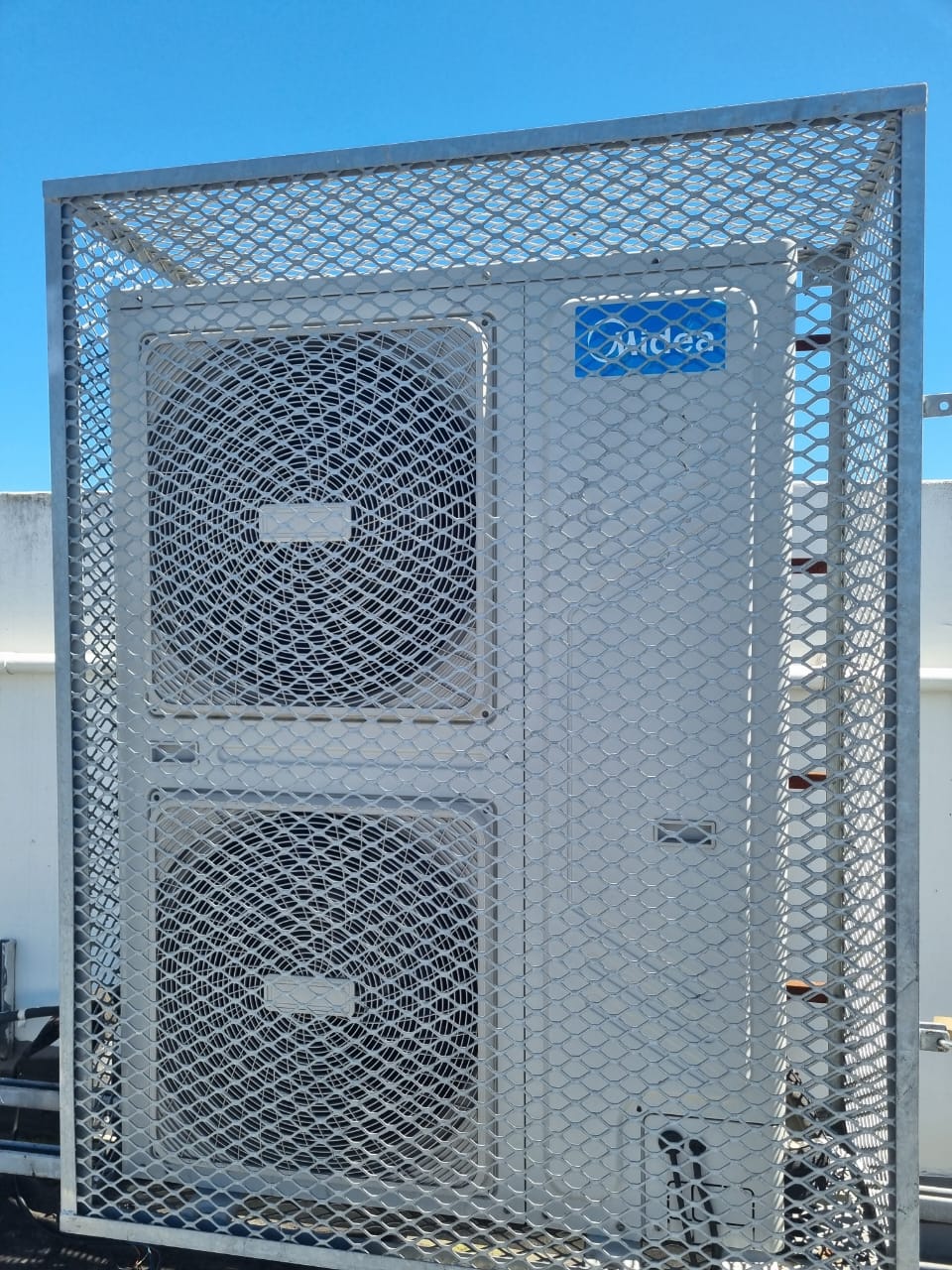 Bespoke Midea condenser security & guard cage — diamond mesh