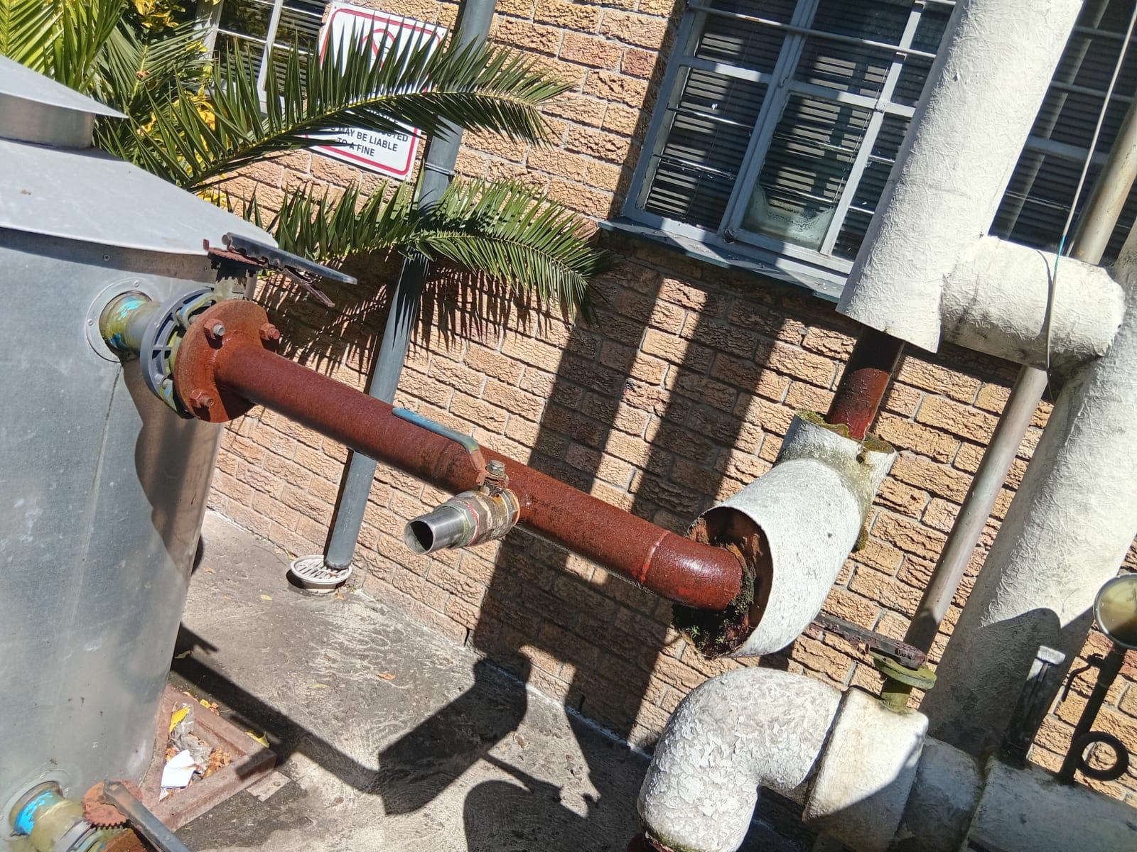 Glycol loop strainer & isolation valves — service access